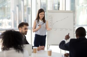 Confident looking woman with graph